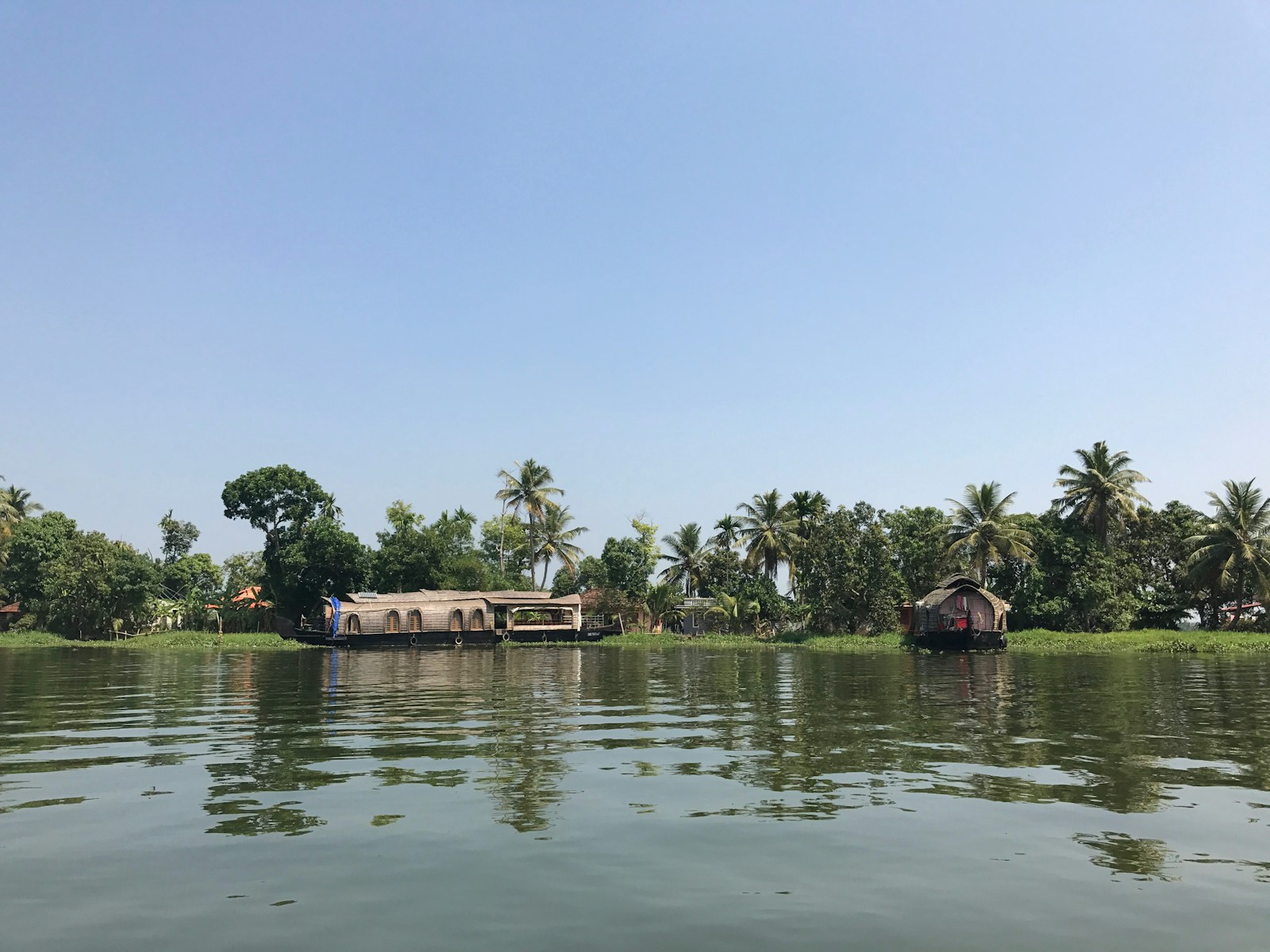 A houseboat on quiet water