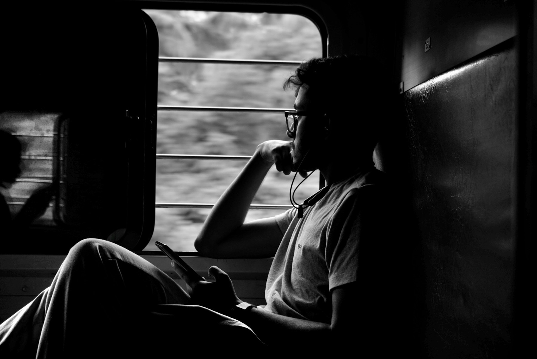 A traveller at an open train window